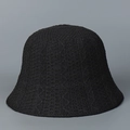 Detail of black knitted bucket hat showing intricate diamond weave and wavy texture pattern - M (56-58cm) / Black