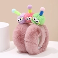 Detail of plush pink winter earmuffs featuring colorful monster pom poms and soft fur - Diameter 13CM / Deep Pink