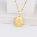 Golden oval locket necklace in polished stainless steel for DIY photos on stone background - Oval Smooth 24*16/Gold