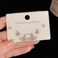Detail of S925 silver stud earrings set featuring sparkling star and saturn planet designs - Silver-Rhinestone Saturn Set (71#)