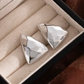 Minimalist silver triangle stud earrings with a hammered metal finish for a modern look - Silver Triangle Buckle