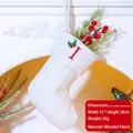 White knitted Christmas stocking with red letter I embroidery and holly leaf pattern - Letter I / White