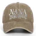 Close-up of white NANA floral embroidery on a vintage washed khaki cotton baseball cap - Adjustable / Khaki
