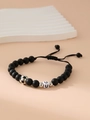 Adjustable black matte beaded bracelet with silver football and white letter U bead - Letter U