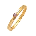 Detail of gold flexible stretch bracelet with a vibrant red heart-shaped zircon gemstone - Bracelet-Red