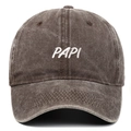 Detail showing white 3D embroidery on washed coffee-colored cotton baseball cap fabric - Coffee
