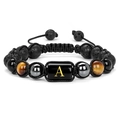 Braided natural stone bracelet with black lava, tiger eye beads and gold letter A - Style A
