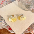 Macro close-up of yellow shell flower earrings with dopamine-style sweet design for summer - Shell Flower Stud Earrings / Yellow
