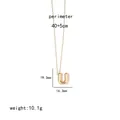 Detail view of golden letter U pendant necklace with specific dimensions and weight details - Letter U
