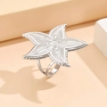 Statement silver starfish open ring with textured radial patterns in a vintage style - J02888 / Silver