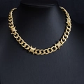Detail of gold Cuban link chain with thorn wire design on a black mannequin bust - 40CM / Gold Necklace