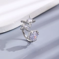 Silver bow-shaped open ring with three sparkling zircons and star-shaped accents - Silver Star Claw Zirconia Ring (6591)