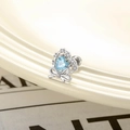 Elegant silver heart earring with blue zircon and bowknot detail on a soft background - Light Sea Blue (Single Piece)