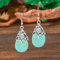 Detailed view of bohemian teardrop earrings hanging on a rustic wooden branch - Teardrop Retro Engraving (HQEF-1387)