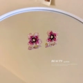 Dettaglio degli orecchini a fiore in cristallo rosa con bordi dorati su specchio - Orecchini a fiore con gemme rosa viola (4# Perno in argento-Rosso)