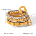 Macro detail of multi-layered stackable rings with zircon inlays and pin accessory - Layered Wave Bead Pattern Style (HC-R30549)