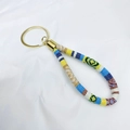 Ethnic bohemian woven wristlet keychain with colorful patterns and gold metal ring - Brown and White Woven