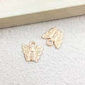 Golden butterfly charms with intricate textures for DIY jewelry making - 1pc Butterfly Charm
