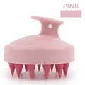 Detailed macro view of soft silicone massage teeth on a pink ergonomic scalp brush - Single Dual Pink Scalp Massager