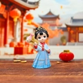 Classic Chinese doll in blue Hanfu holding a pink fish prop, elegant traditional style - Yaoxi