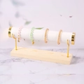 Solid wood bracelet stand with gold metal support and white leather jewelry display bar - 1-Tier White Leather