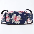 Universal stroller organizer bag with dark blue floral pattern and side hanging loops - Sapphire Peony