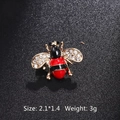 Miniature bee brooch in red and black enamel with white crystal wings and gold frame - Red Black Contrast Bee