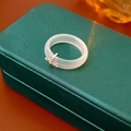 Detail of white chalcedony ring featuring a delicate silver dragonfly charm on a jewelry box - Transparent Silver Dragonfly Pendant