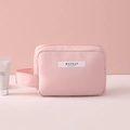 Pink waterproof nylon makeup bag with top handle and MAKEUP BEAUTY label on front - Pink Small