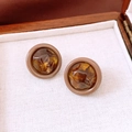 Macro shot of retro round acrylic stud earrings featuring brown tortoiseshell resin texture - Acrylic with 925 Silver Pin / Coffee Round