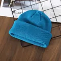 Classic knitted lake blue beanie hat with ribbed texture for winter warmth - Lake Blue
