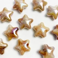 Amber star-shaped beads with iridescent UV coating for DIY jewelry making and phone charms - Coffee