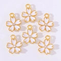 Colorful sakura flower pendants with gold borders and sparkling center crystals for DIY - White