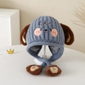 Detail of blue knit hat for kids with plush puppy ears and embroidered cartoon face - 3-8 Years / Blue