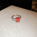 Macro view of adjustable butterfly ring with red zircon stone and micro-pave crystals - Style 16# Rectangular Red Zircon