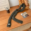 Dark grey knitted sausage scarf for women featuring a minimalist white textile label - Army Green