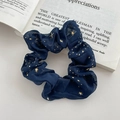 Navy blue chiffon hair scrunchie with gold star pattern on a vintage book background - FQ1068D Navy Blue Star Scrunchie