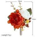 Handmade boutonniere with orange and white roses, red berries and rustic hemp rope wrapping - Caramel Orange Boutonniere
