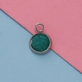Close-up of 12mm silver stainless steel pendant with green faux gemstone on split background - Green Faux Gemstone Style (28)