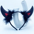 Detail of black glitter devil horns headband with faux feathers for Halloween costume - Black Glitter Horn With Feathers