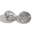 Silver stainless steel stud earrings featuring a circular evil eye embossed design - Long Eyelash Eye Disc Stud Earrings - Silver