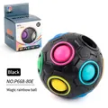 Black Magic Rainbow Ball puzzle toy with multi-colored buttons and display packaging - Black Chinese Boxed