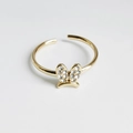 Adjustable 18K gold plated ring with glittering pavé crystal rabbit ears on white background - Ribbon Bow Gold