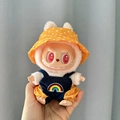 Plush doll accessory set featuring a yellow polka dot hat and rainbow denim overalls - Rainbow Yellow Polka Dot Set / First And Second Generation Keychains Are Compatible With La Cloth Dolls. Dolls Not Included.
