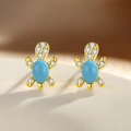 Golden sea turtle stud earrings with sky blue opal stone and white zircon accents - 925 Silver / Gold (Plastic Stopper)