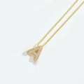 Detail of gold letter A pendant with pave-set white zircons on a classic chain necklace - Letter A