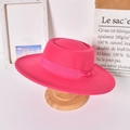 Pink wide brim wool felt jazz hat with matching ribbon on a wooden display stand - Adult / Rose Pink (Bowknot)