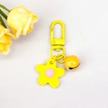 Cute yellow flower keychain with matching bell and D-shaped hook for girl bags - Yellow
