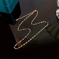 Detail of a 40cm golden stainless steel scale chain with lobster clasp and extender - Lips Chain / Rose Gold
