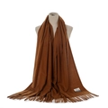 Detail view of the caramel winter warm tassel scarf, soft cashmere feel and fringe. - Caramel color